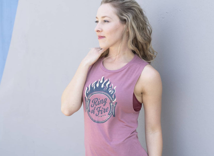 A more feminine version of the traditional muscle tee!